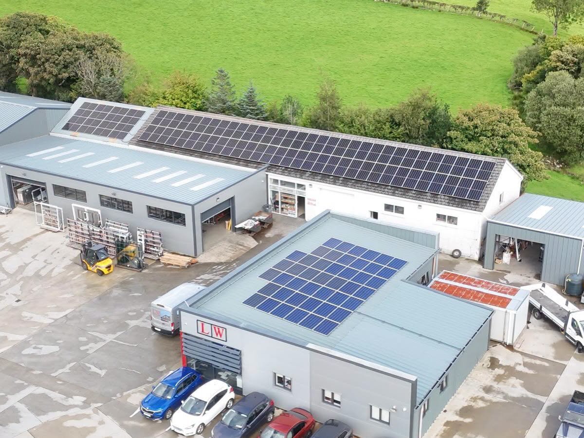 Solar panel arrays across the rooftops of the LW business premises