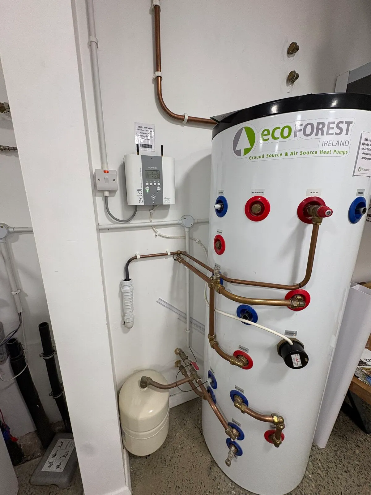 Ecoforest ground and air source heat pump hot water cylinder with copper pipework in the Efficient Renewables showroom